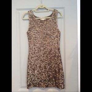 Gold sequin mini dress. Statement piece!